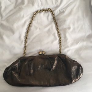 Black purse with gold chain